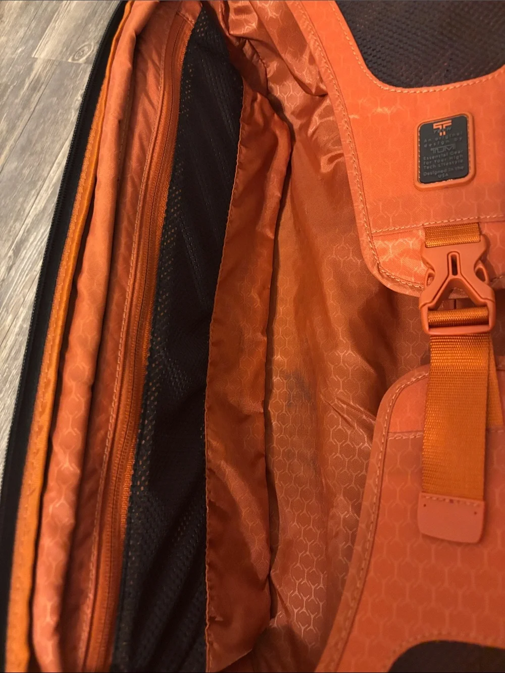 Tumi Black Carry-On Wheelaway with Orange Trim